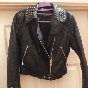 Biker style leatherette jacket with studs accents